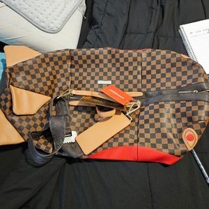 Sprayground Sharkfinity Shark shaped duffle